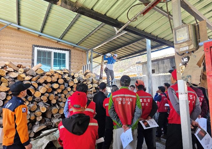 함양군 화목보일러 자동확산 소화기 및 재처리기 배부